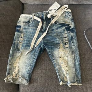 COPY - Brand new. Unworn. Blue washed distressed YoungLA jean shorts. Size 30